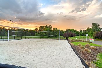 Sand volleyball court at Avalon Apartment Homes in Starkville, MS