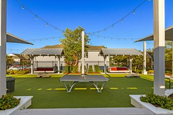 Outdoor pingpong and lounge at Crossgates Apartment Homes, Starkville, MS 39759