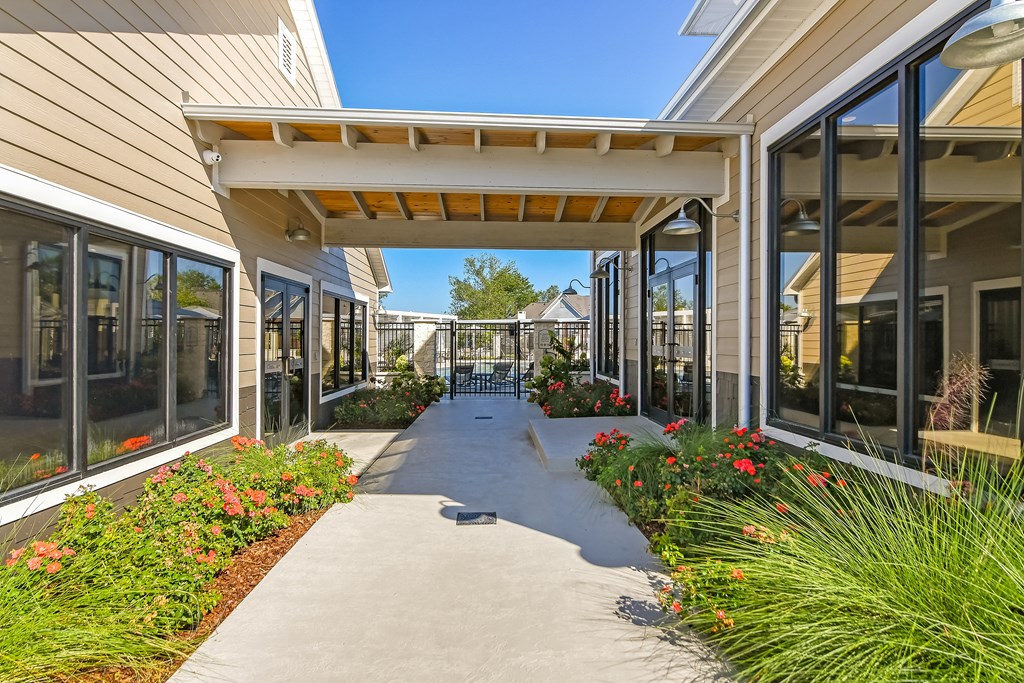 the preserve at ballantyne commons community walkway and patio at Crossgates Apartment Homes, Starkville, MS