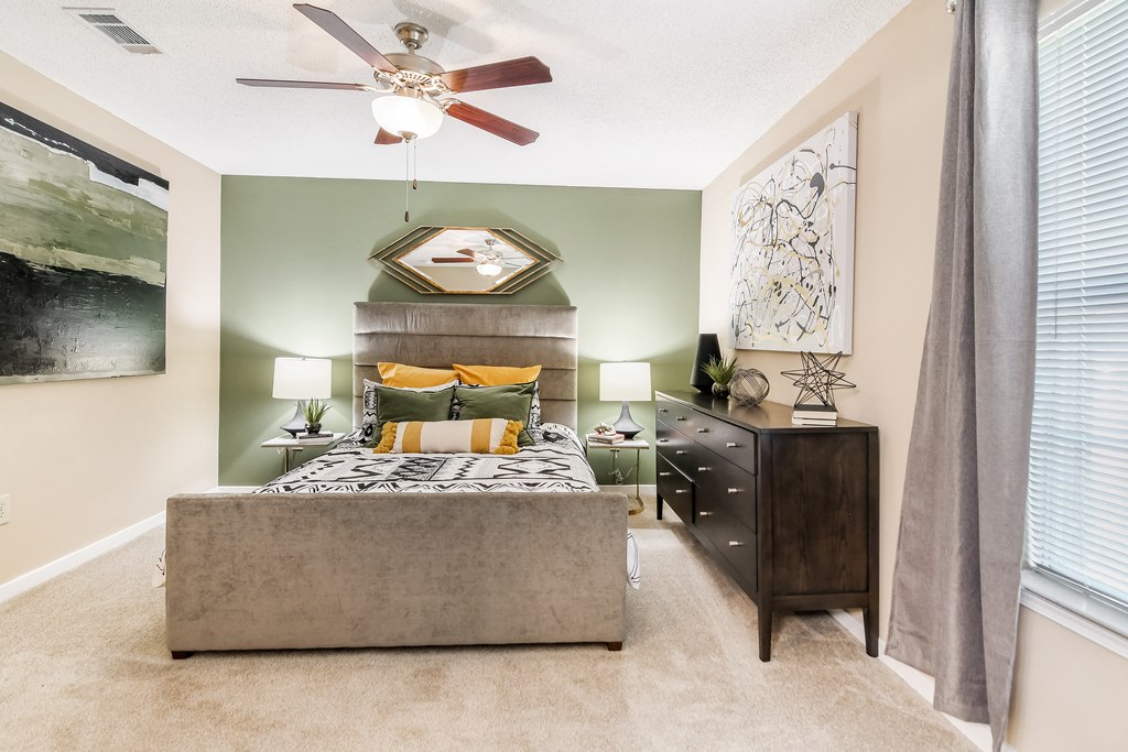 a bedroom with a bed at Crossgates Apartment Homes, Starkville, MS 39759
