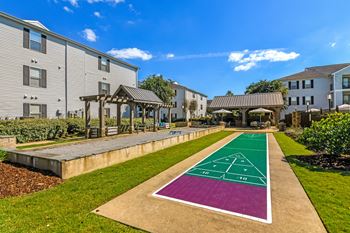Shuffleboard and Bocce Ball court at Avalon Apartment Homes in Starkville, MS 39759