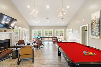 Game room with billiards Lexington Pointe Apartment Homes in MS 38655