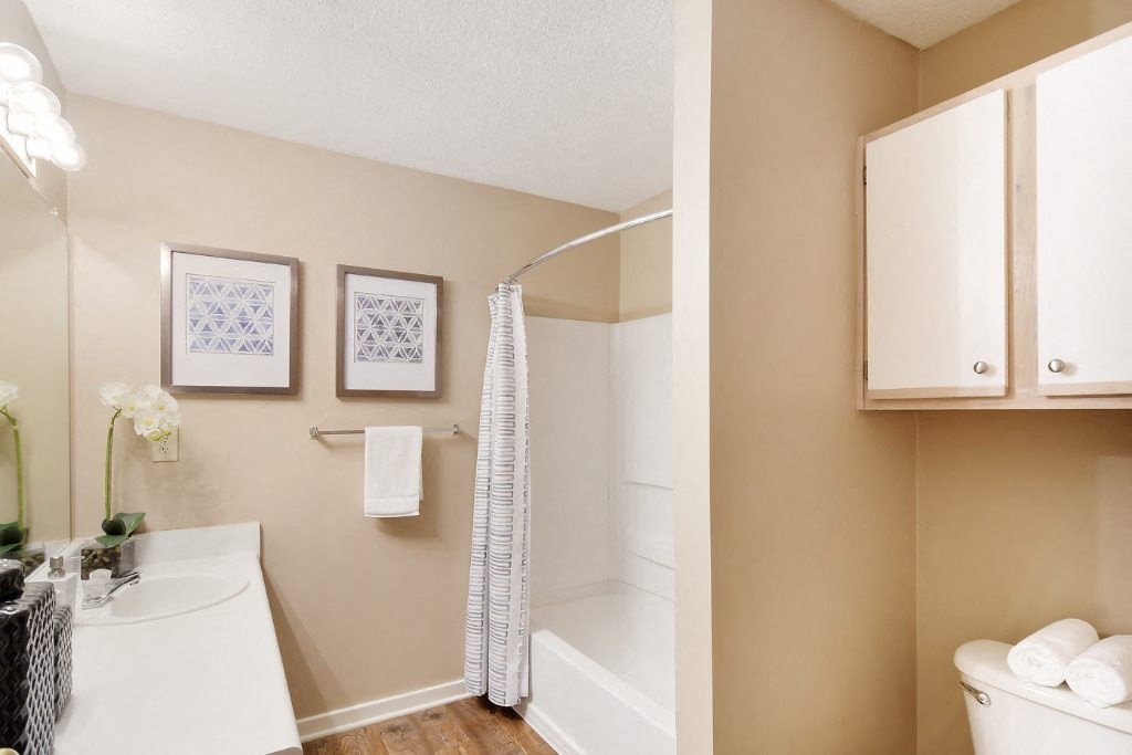 our apartments offer a bathroom with a shower at Lexington Pointe Apartment Homes, Mississippi, 38655