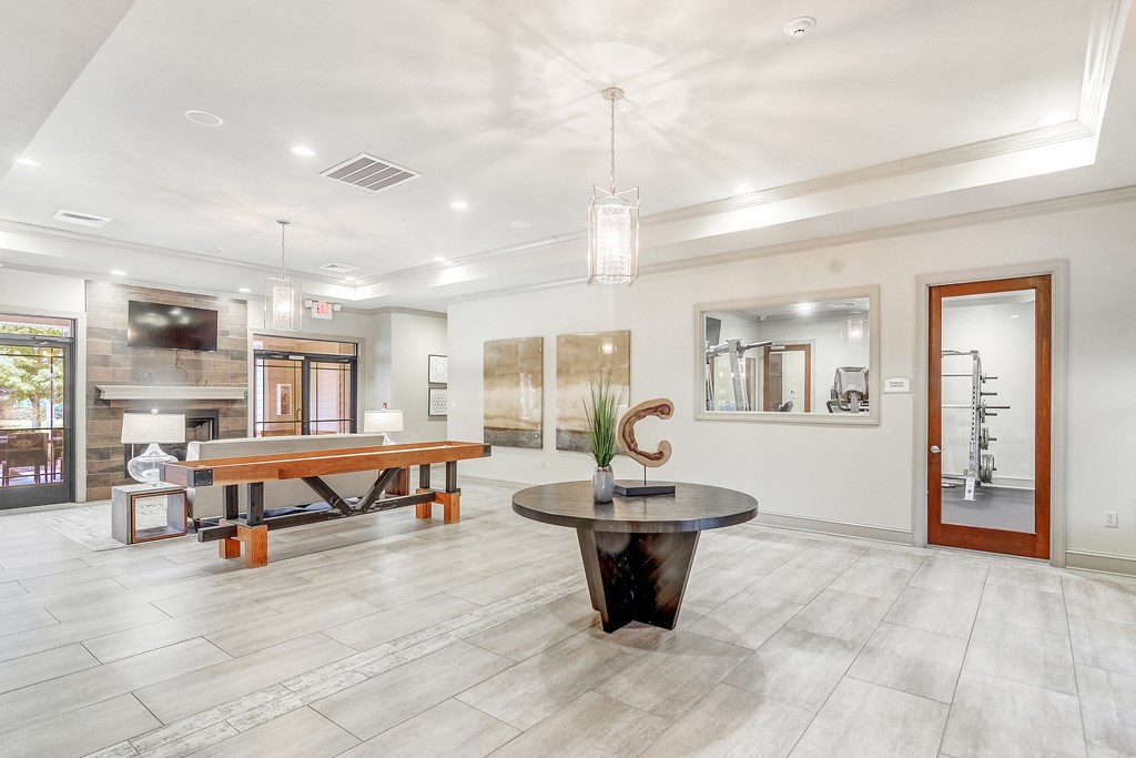 club room with a pool table at Cambridge Station Apartment Homes, Oxford, Mississippi