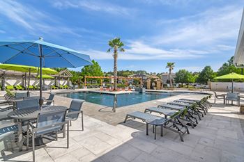 the swimming pool at the resort at longboat key club at Reserve at Gulf Hills Apartment Homes, MS