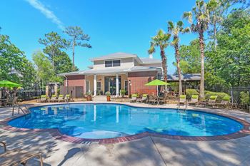 a swimming pool at Lagniappe of Biloxi Apartment Homes in Biloxi, MS