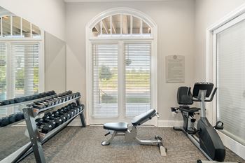 gym with exercise equipment at Lagniappe of Biloxi Apartment Homes in Biloxi, MS