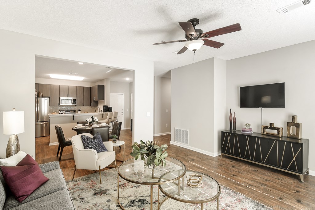 Stylish Tv Cabinet In Living Room at Lagniappe of Biloxi Apartment Homes, Biloxi, MS, 39532