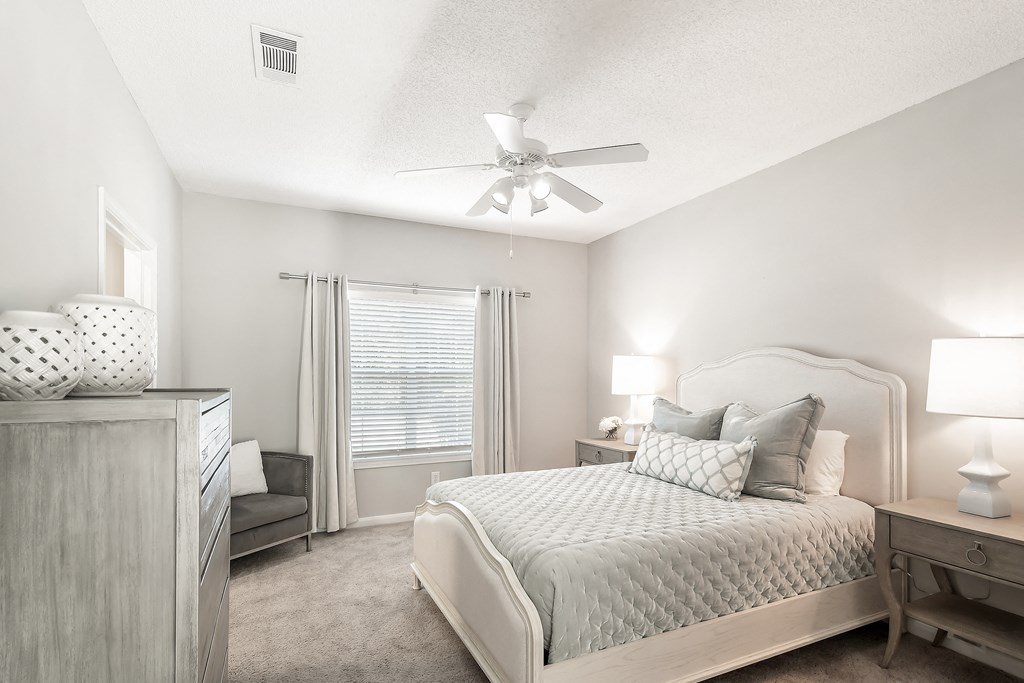 Well Decorated Bedroom With Plenty Of Natural Lights at Lagniappe of Biloxi Apartment Homes, Biloxi, MS, 39532