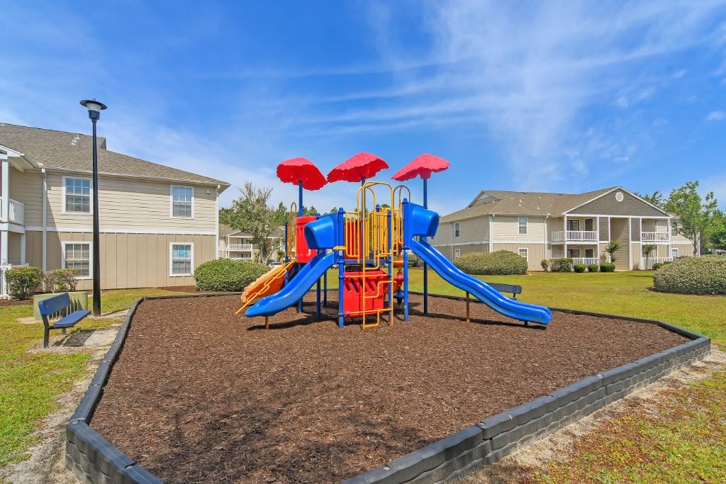 our apartments offer a playground for your little ones  at The Pointe Apartment Homes, Gautier, MS