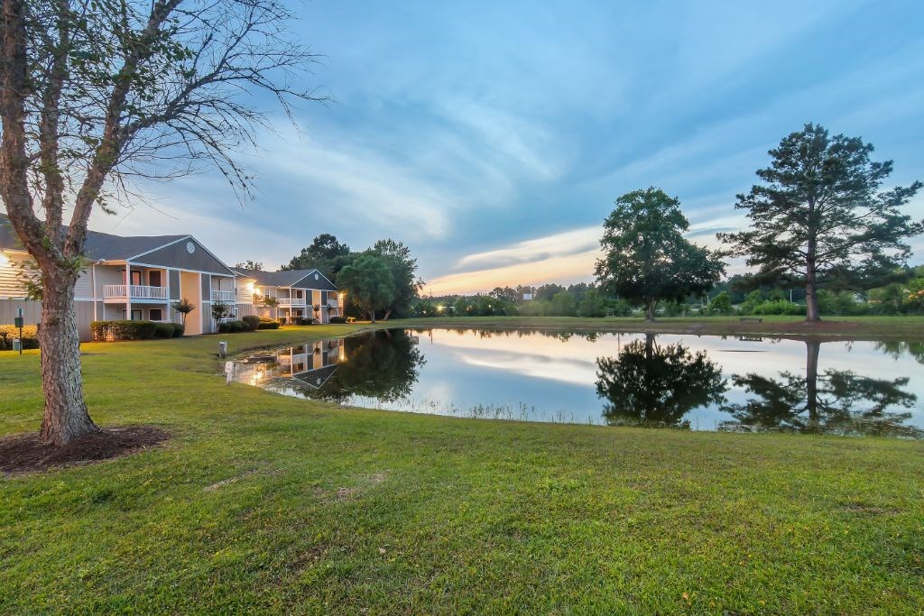 the preserve at ballantyne commons community pond  at The Pointe Apartment Homes, Gautier, MS