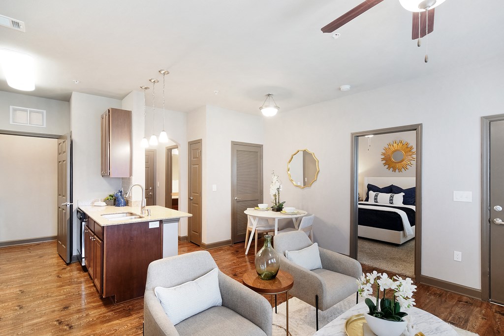Living room and kitchen with a bedroom at Kingston Crossing Apartment Homes, Bossier City, LA, Louisiana  , 71111