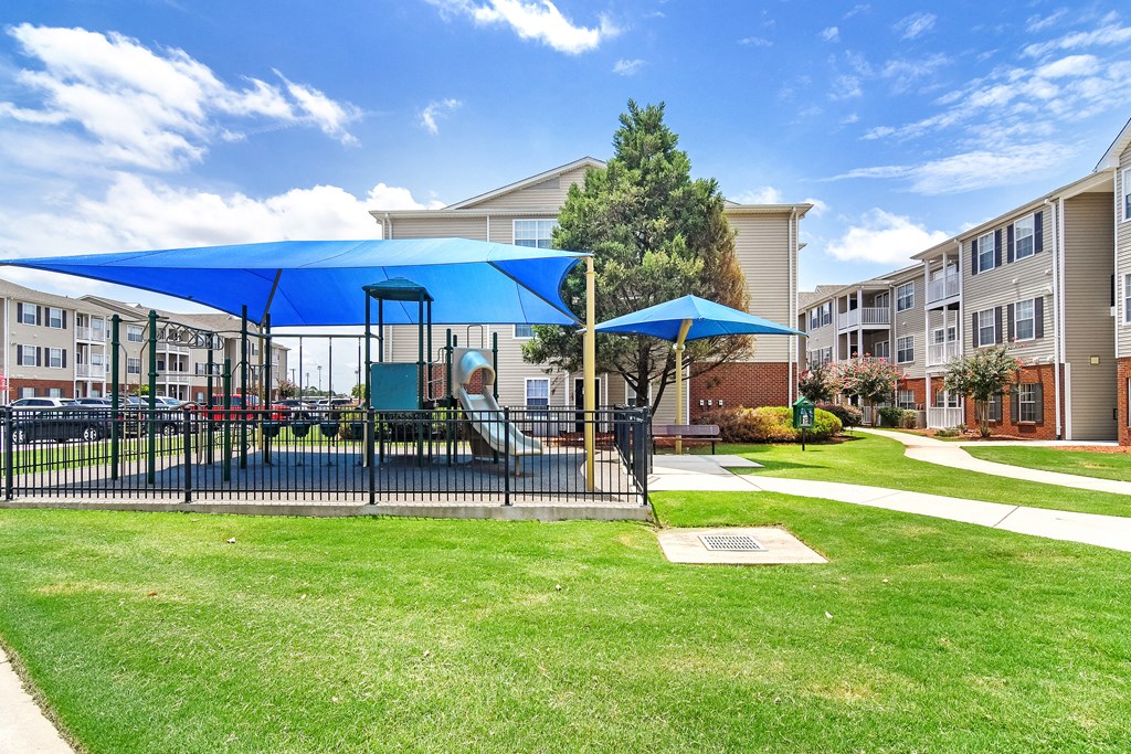the preserve in play area with playground equipment at Summit of Shreveport Apartments, Shreveport, Louisiana