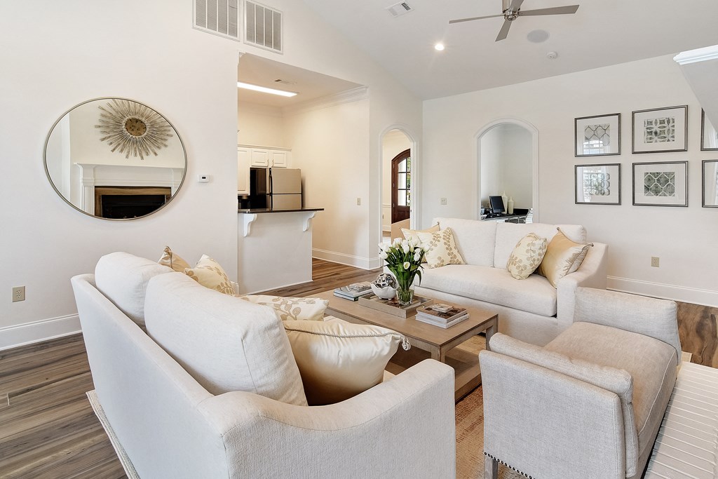 a living room with couches and chairs and a coffee table at Summit of Shreveport Apartments, Shreveport, 71105
