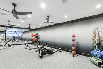 Fitness center at The Woodlands Apartment Homes, Meridian, MS