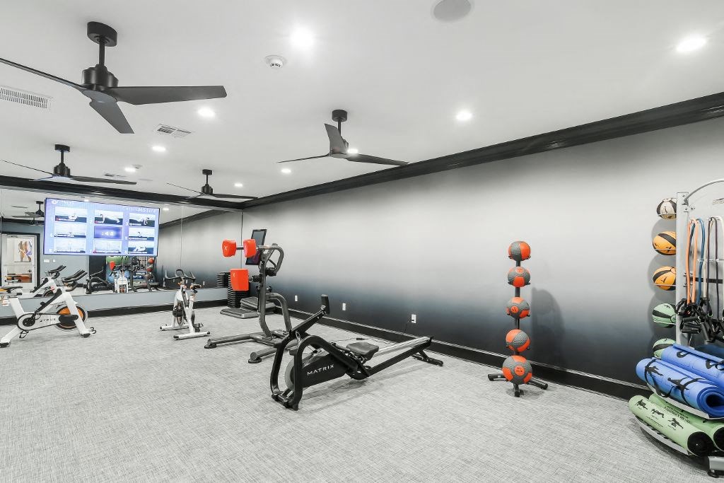 the gym at the m on hennepin apartments in minneapolis, mn at The Woodlands Apartment Homes, Meridian, MS, 39301