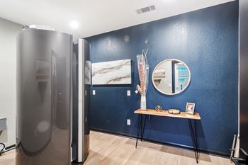 Stand up tanning bed at The Woodlands Apartment Homes, Meridian, Mississippi