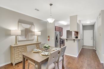 Hardwood flooring in dining room at Ashford Place Apartment Homes, Flowood