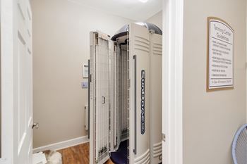 Stand up tanning bed at Legacy Apartment Homes in Ridgeland, MS