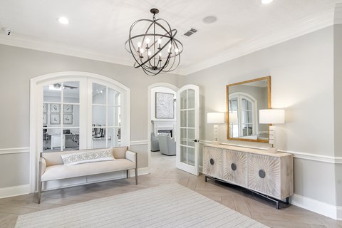 a living room with a couch and a dresser at Bridgewater Apartment Homes, Brandon, MS 39047
