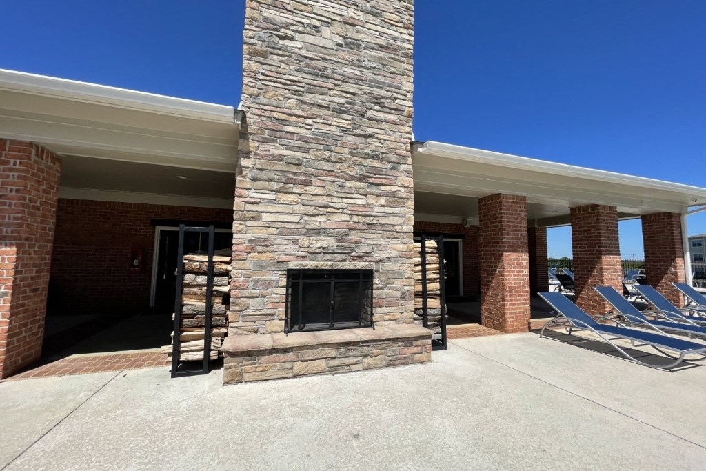 Outdoor Fireplace at Cumberland Place Apartment Homes, TX