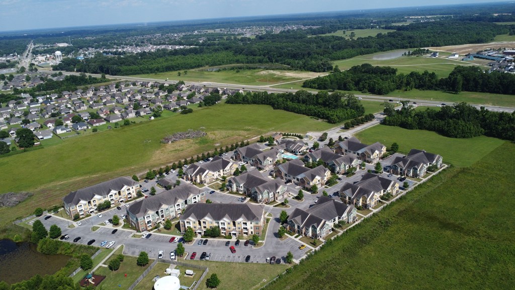 an aerial view of a large affluent suburb of houses at Audubon Park Apartment Homes, LA