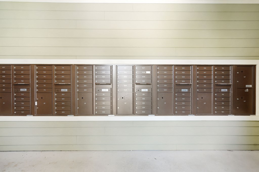 a row of lockers on the wall of a building at Audubon Park Apartment Homes, Louisiana, 70791