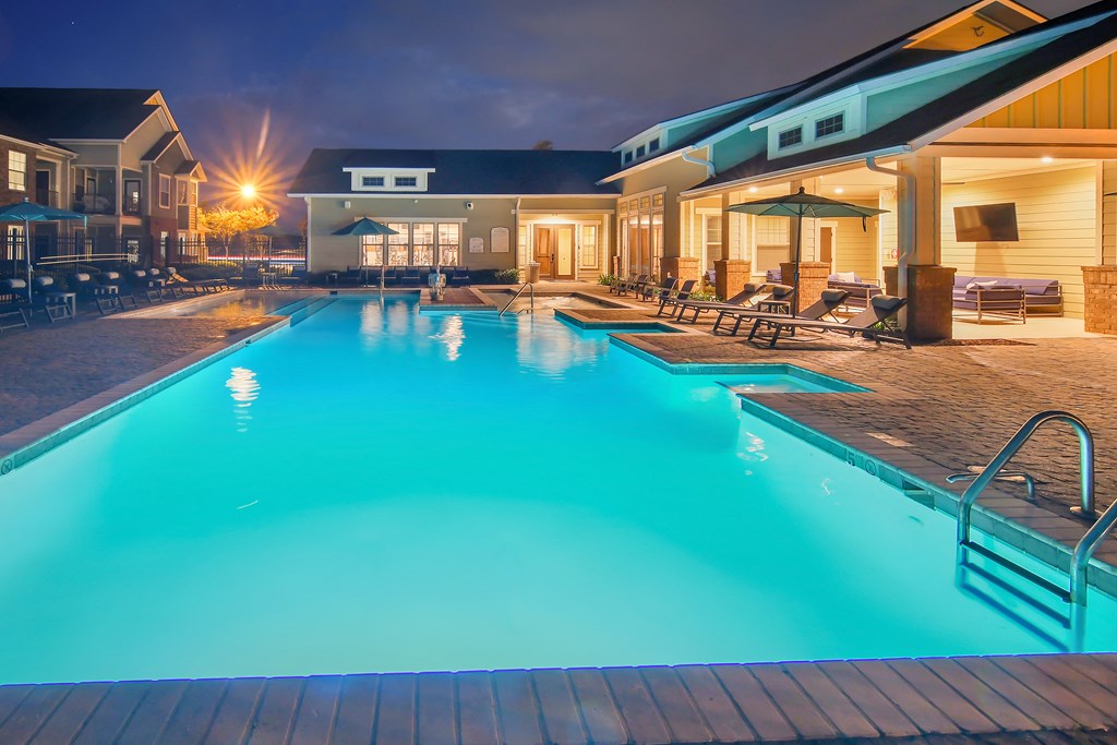 the swimming pool at the resort at night at Audubon Park Apartment Homes, Louisiana, 70791