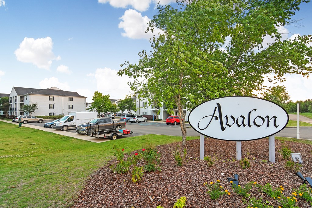 a view of the ardleton apartments sign in front of the parking lot at Avalon Apartment Homes, Starkville, MS, 39759