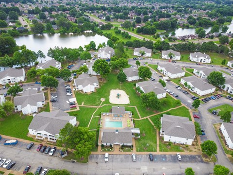 an aerial view of a neighborhood with a pool in the middle at The Oliver Apartment Homes, Mississippi, 38654