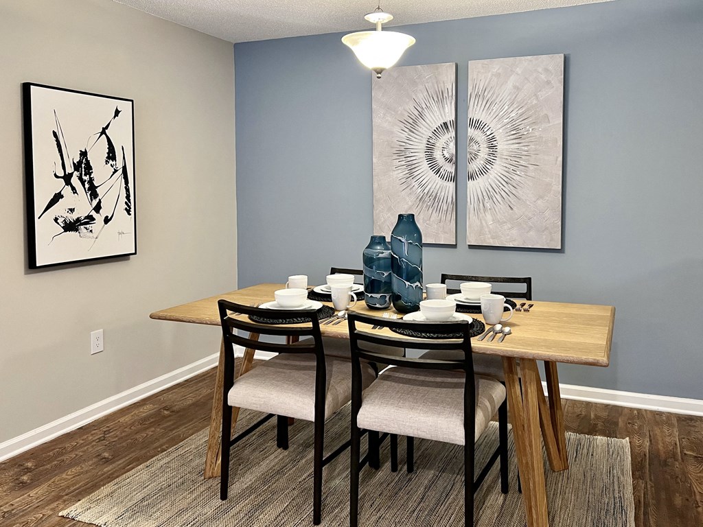 our spacious dining room has a large table for 6 at Reserve at Park Place Apartments, Mississippi 39402