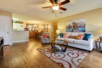 Living Room with Kitchen and Dining Room View Living Room with Kitchen and Dining room View at Reserve of Jackson Apartment Homes, Jackson, Mississippi, 39211 - Photo Gallery 3
