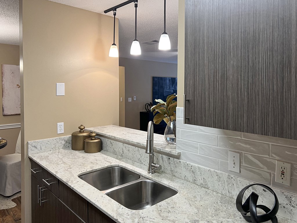 kitchen sink and light fixtures at Reserve of Bossier City Apartment Homes in Bossier City, Louisiana 71111