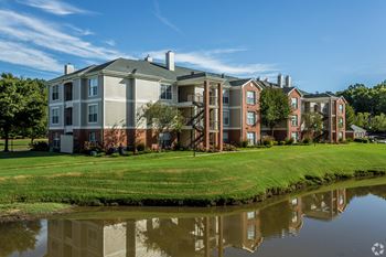 Exterior View With lake at Quail Ridge Apartment Homes, Bartlett