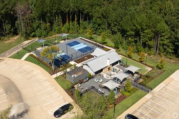 Aerial view of pickleball court and outdoor lounge at Reserve at Park Place Apartments, Mississippi