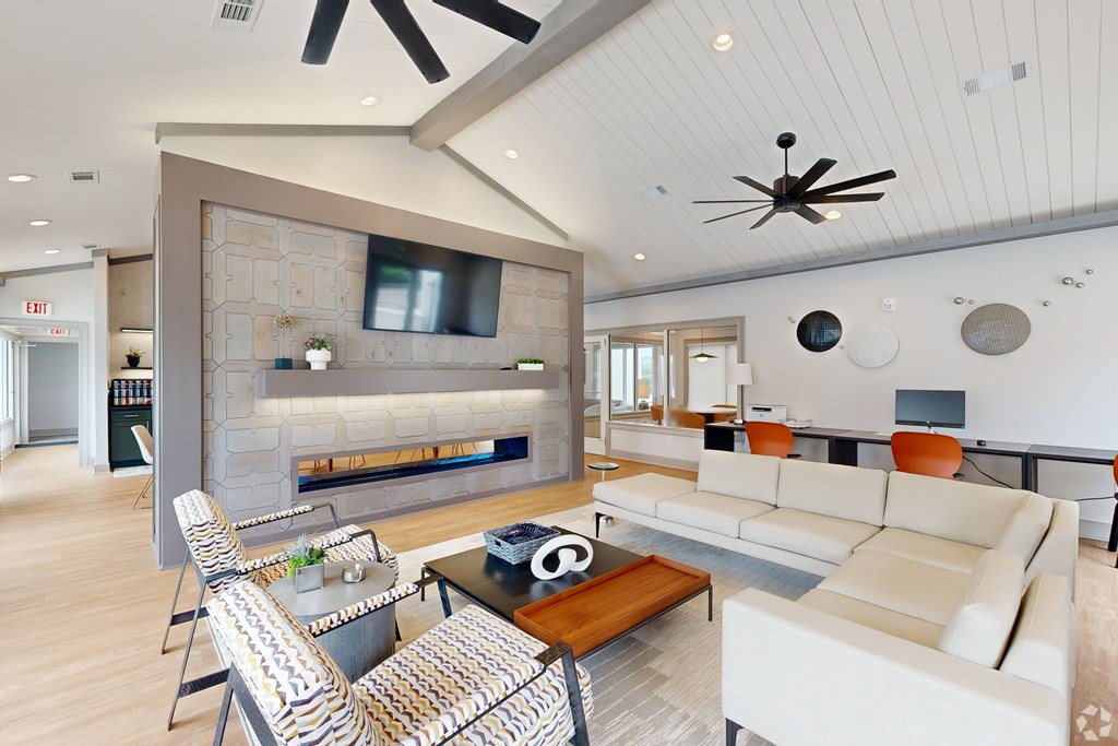 Lounge With TV And Fireplace at Reserve at Park Place Apartment Homes, Hattiesburg, MS, 39402