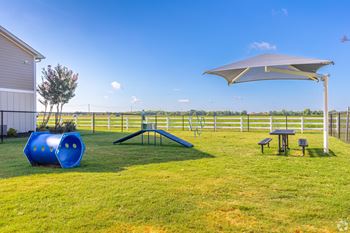 Dog park with activities at Reserve at Park Place Apartment Homes in Bossier City, LA