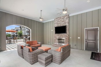 Pool Seating Area with Television at Colonnade at Eastern Shore Apartment Homes, Daphne, 32526