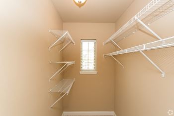 A room with a window and shelving units at The Retreat Apartment Homes in Williston, North Dakota 58801