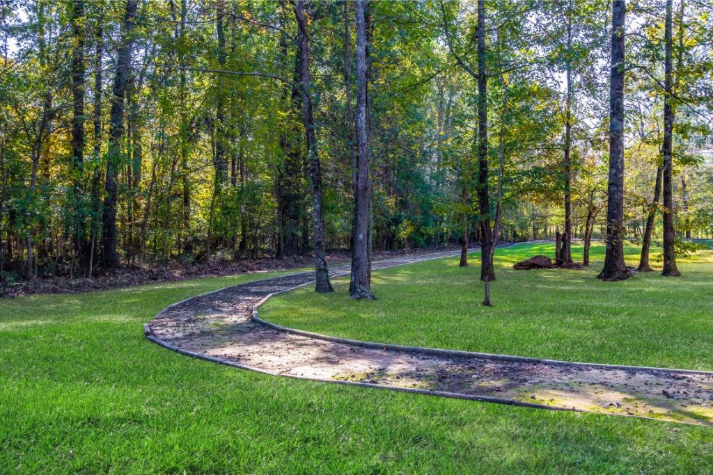 Beautiful Walking Trail at The Vineyard at Castlewoods Apartment Homes, Brandon, MS