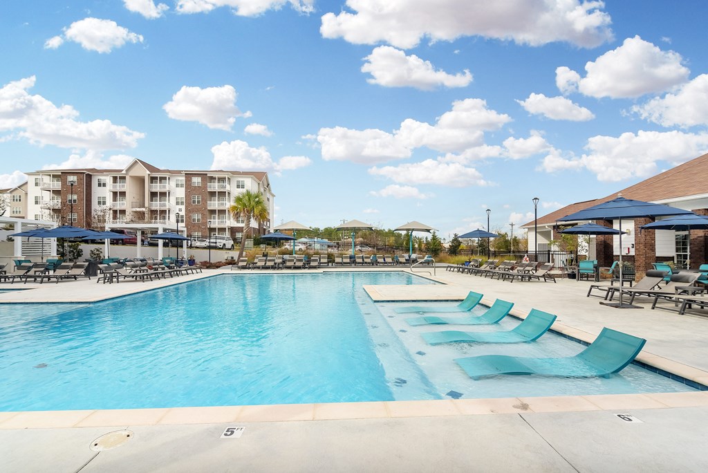 the swimming pool at the resort at governors crossing at The Met Apartment Homes, Hattiesburg, Mississippi