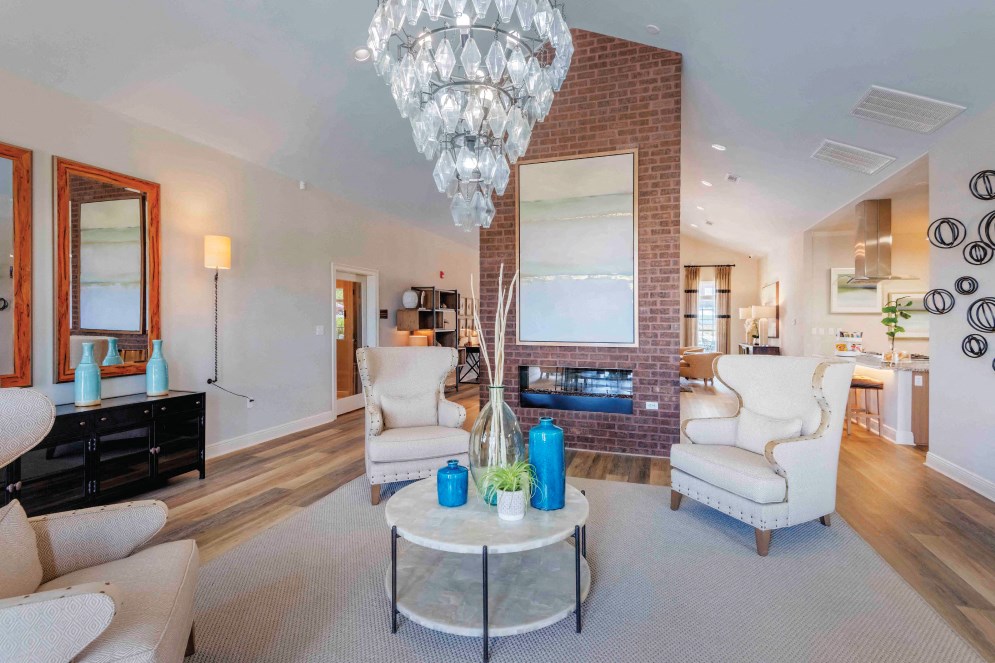 Living Room with a Fireplace at The Met Apartment Homes, Hattiesburg, 35402