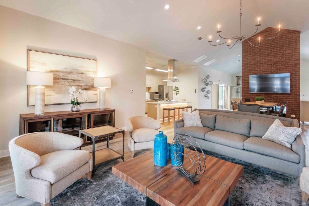 Living Room with a Television at The Met Apartment Homes, MS