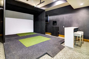 Golf Simulator Golf Simulator at The Retreat Apartment Homes, North Dakota - Photo Gallery 4