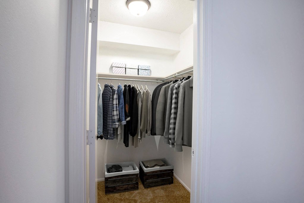 a walk in closet in a 555 waverly unit