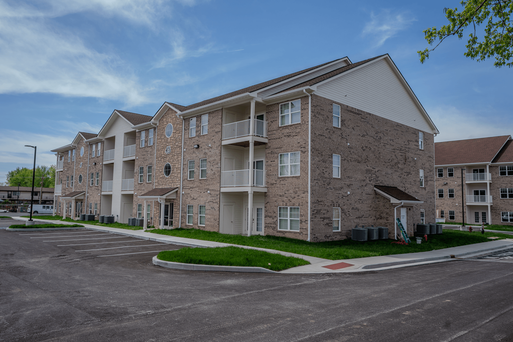 Apartment Building Exterior at The Village at Sandstone Apartments, Greenwood, IN 46142