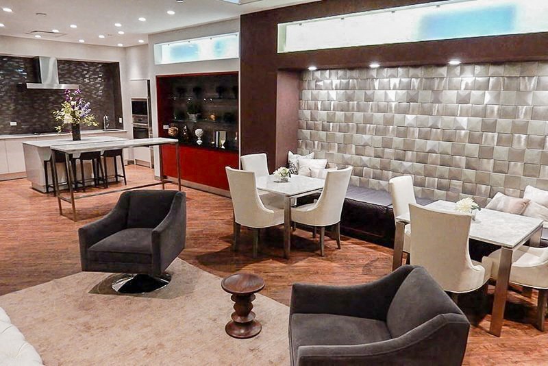 a restaurant with a bar and tables and chairs