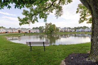 Community Lake Lake With Lush Natural Surrounding at Lake Camelot Apartments, Indianapolis, Indiana - Photo Gallery