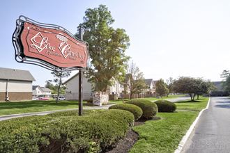 Welcoming Property Signage at Lake Camelot Apartments, Indiana, 46268 - Photo Gallery 1