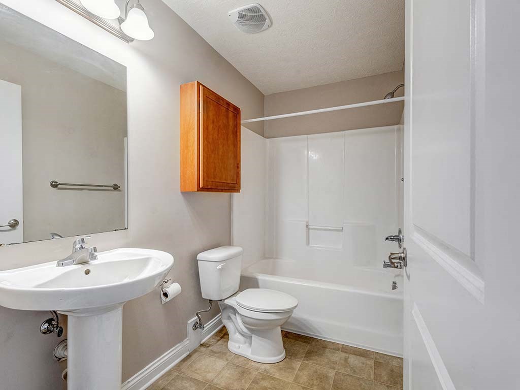 Spacious bathroom with storage at HUB of New Albany, New Albany